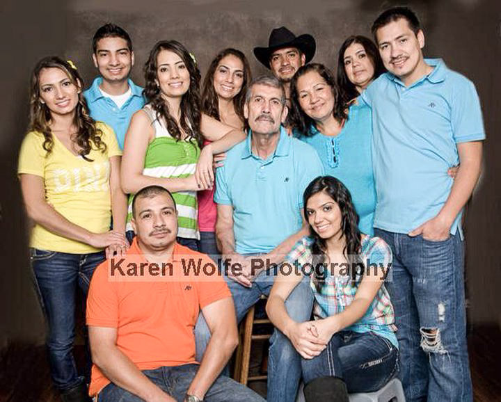 Simon Mendoza in a family photo with his parents and eight brothers and sisters.