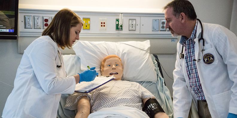 Photo of a PA student in the SIM Lab