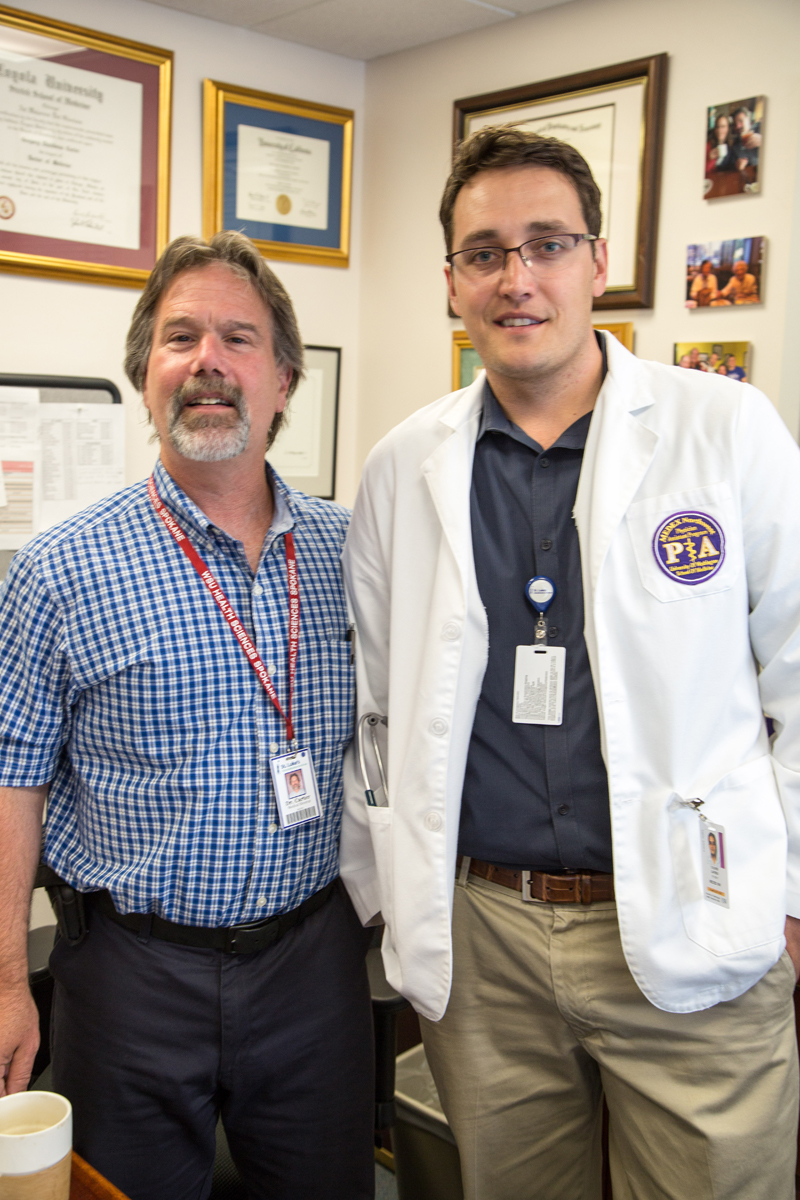 Greg Carter, MD and Tucker Larsen in Dr. Carter’s office.