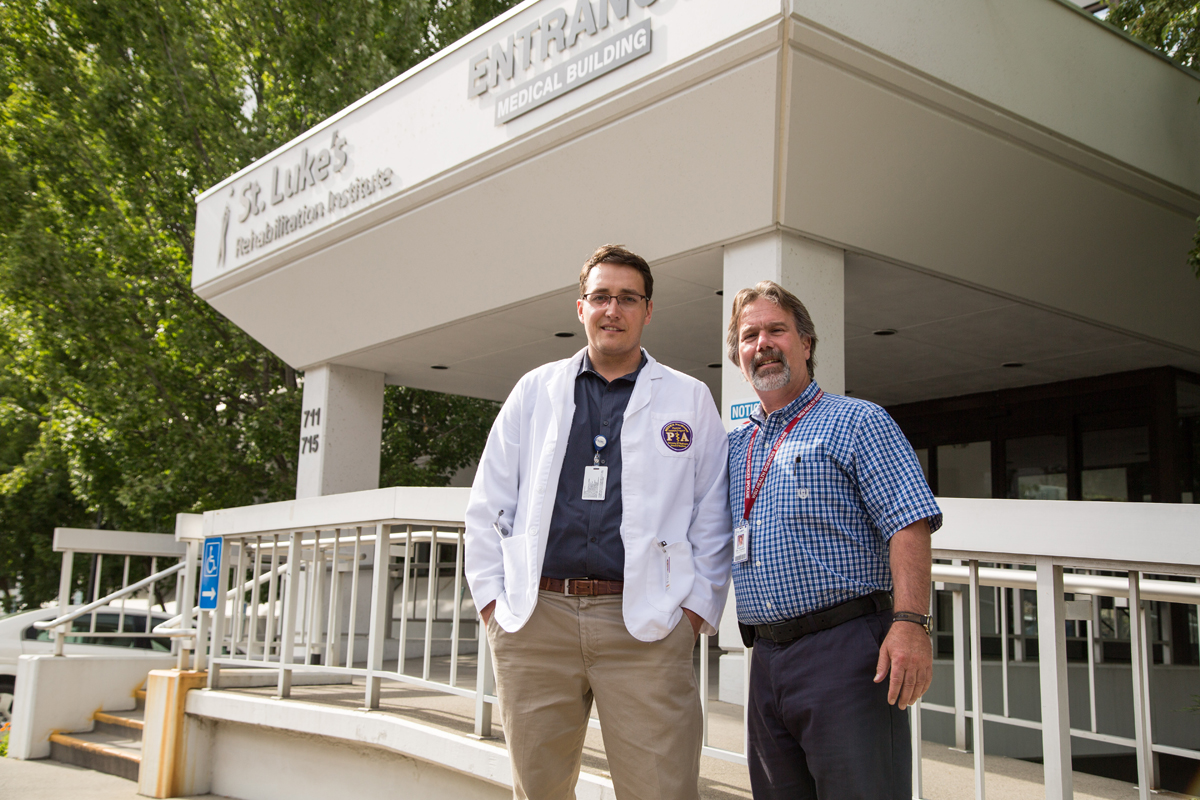 Tucker Larsen and Greg Carter, MD outside St. Luke's Rehabilitation Center in Spokane, WA. 