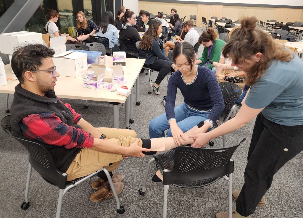 Students learning to splint